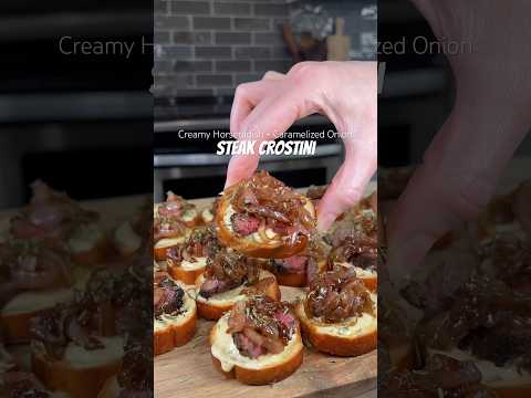 STEAK CROSTINI WITH A CREAMY HORSERADISH SAUCE & CARAMELIZED ONIONS