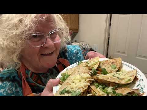 Best Duck tortillas. Dressed with cilantro, chopped onions and mozzarella.