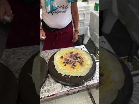 Watching them make Fresh ham, cheese 🧀, mushroom 🍄 crepe at Beverly Hills Farmers' Market