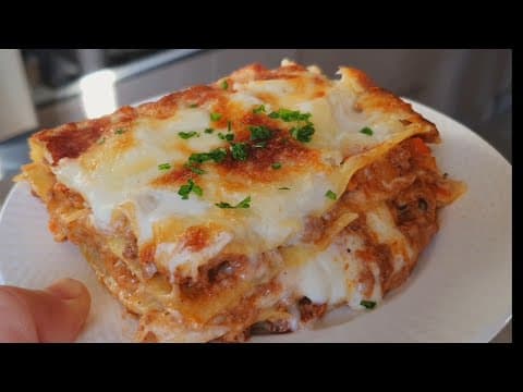 Homemade lasagna with Bolognese and béchamel - Italian Main Course Homemade lasagna with Bolognese and béchamel - Delicious Italian main course with medium difficulty. Perfect recipe converted from YouTube video to PDF format.